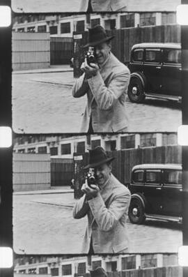 [A J Sylvester with his cine camera]