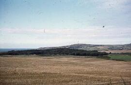 Harvest field from Llanfaethlu churchyard : looking towards Pen-y-foel & Church Bay.