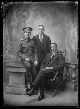 [Soldier in the Welsh Regiment with two civilians]
