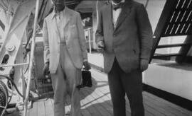 [David Lloyd George aboard ship with unidentified man]