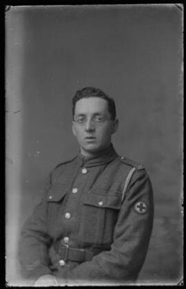 [Bespectacled soldier in the Royal Army Medical Corps]