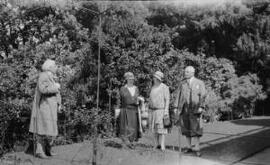 [David & Margaret Lloyd George with another couple in an unidentified garden]