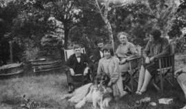 [Group photo taken in a garden including Margaret Lloyd George, Olwen Carey-Evans and others]