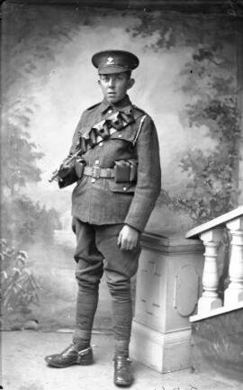 [Welsh Regiment Private wearing bandolier and spurs]