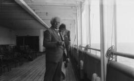 [David and Margaret Lloyd George standing on the deck of a ship]