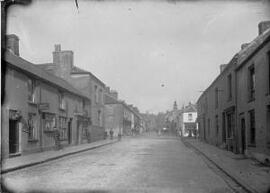 [Unidentified street with premises of 'W Stafford, Artistic Photographer']