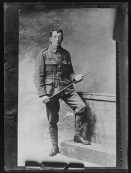 [Copy photograph of a young bareheaded soldier]