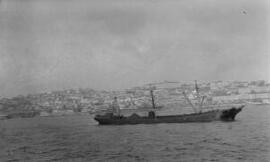 [Tramp steamer moored off Lisbon]