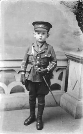 [Little boy in WW1 officer style uniform]