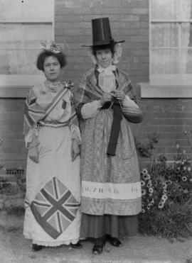 [Two ladies in costumes]