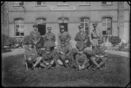 [Group of officers and Canadian soldier]