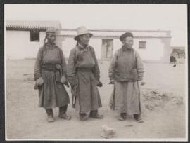 [Three Mongolian men in traditional costume]