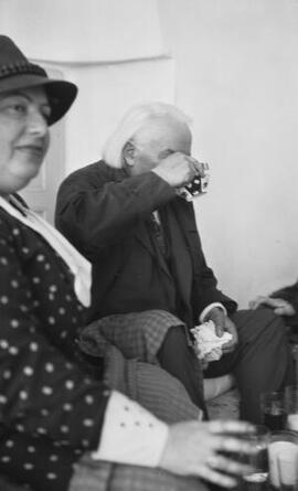 [David Lloyd George drinking from a cup]
