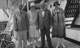 [David Lloyd George with two women and a man aboard a ship]