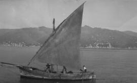 [Wooden fishing boat with lateen sail]